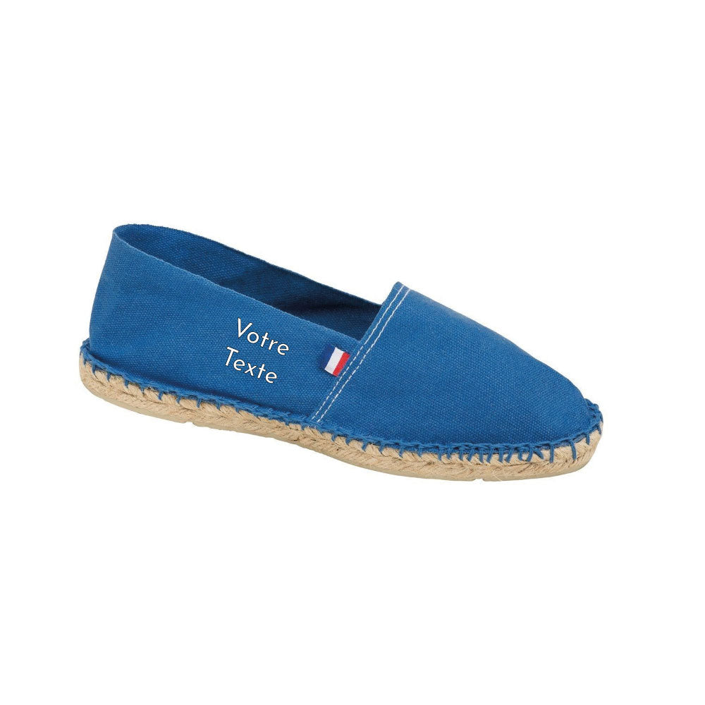 Espadrilles unisexes personnalisées Made in France – impression de texte sur le côté, toile 100 % coton, semelles en jute et caoutchouc bleu.
