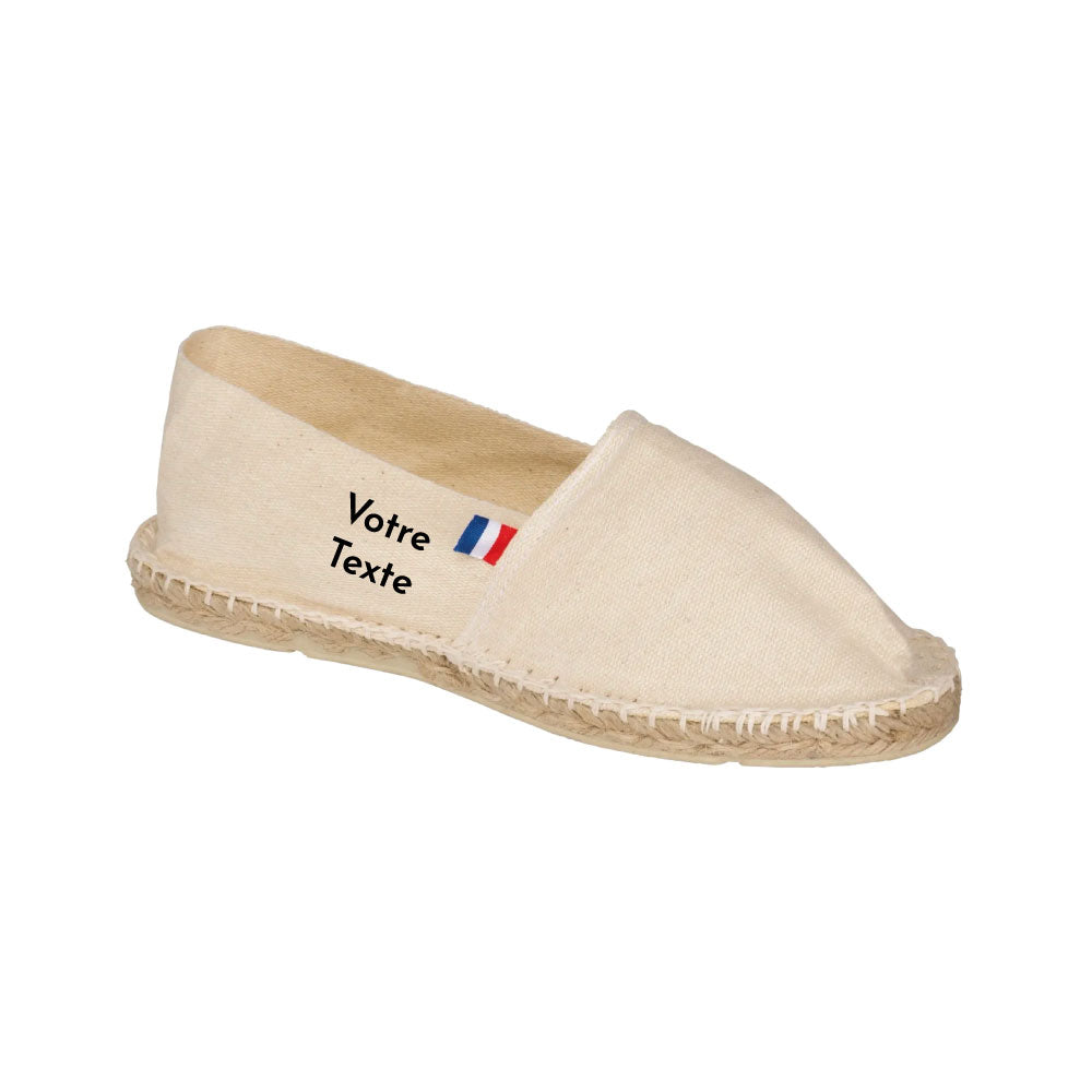 Espadrilles unisexes personnalisées Made in France – impression de texte sur le côté, toile 100 % coton, semelles en jute et caoutchouc beige.