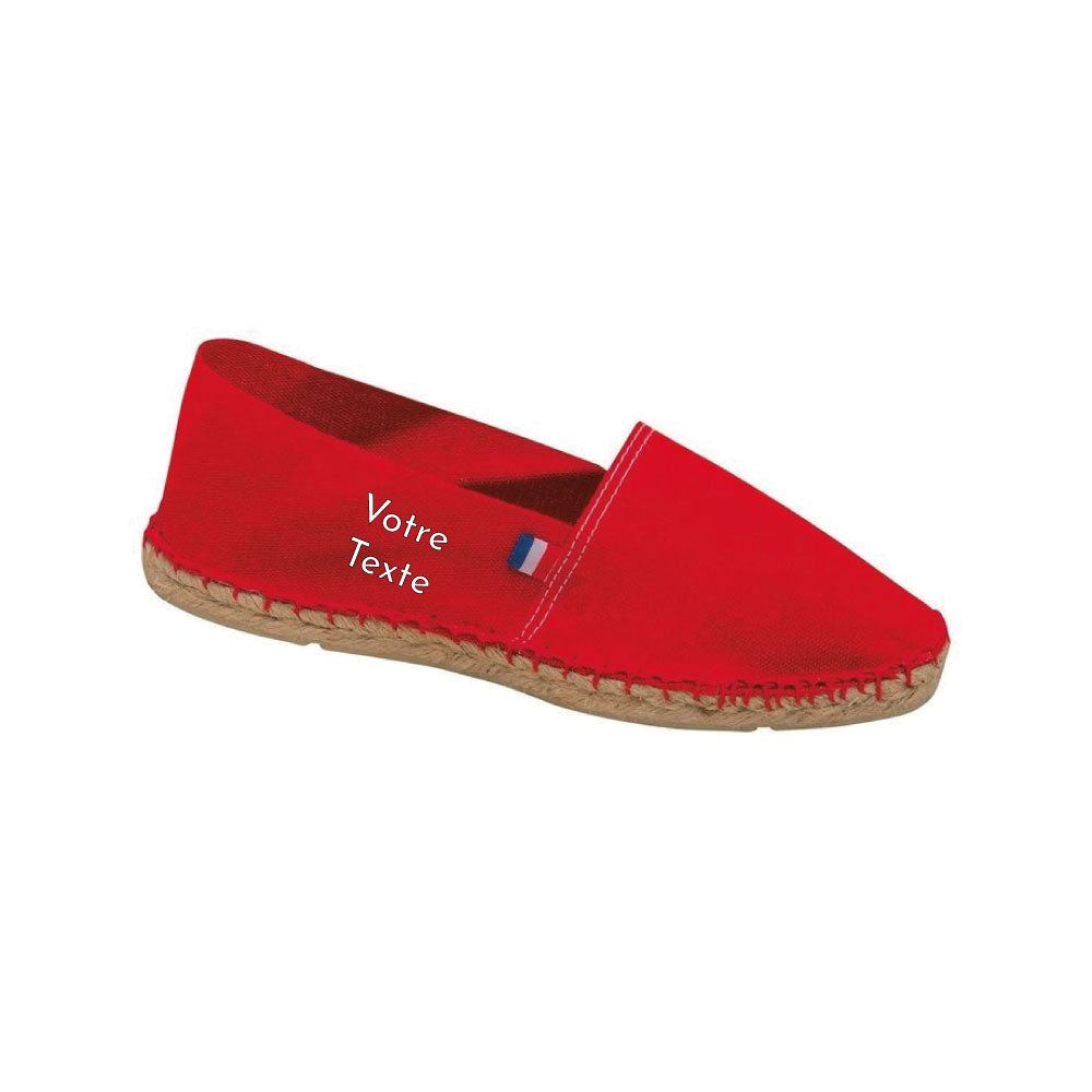 Espadrilles unisexes personnalisées Made in France – impression de texte sur le côté, toile 100 % coton, semelles en jute et caoutchouc rouge.